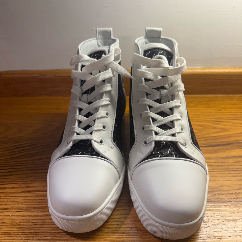 Like new, Christian Louboutin high top sneakers. Worn three times.